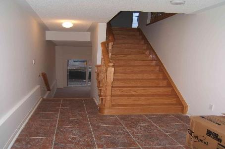 front foyer with stairs up to main level or a couple of stairs to family room